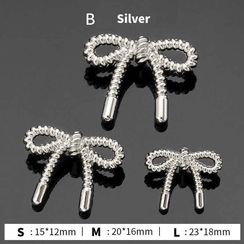Style B stick buttons: silver ribbed loops with silver stems, 3 sizes shown