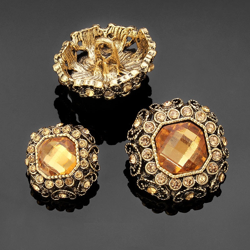 Rhinestone coat shank buttons: amber faceted fronts with gold-tone shank backs and ornate detailing