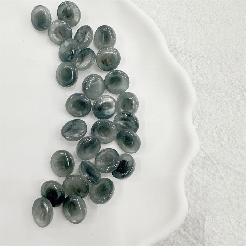 Round resin shank buttons in dark teal/green tones, 11.5mm