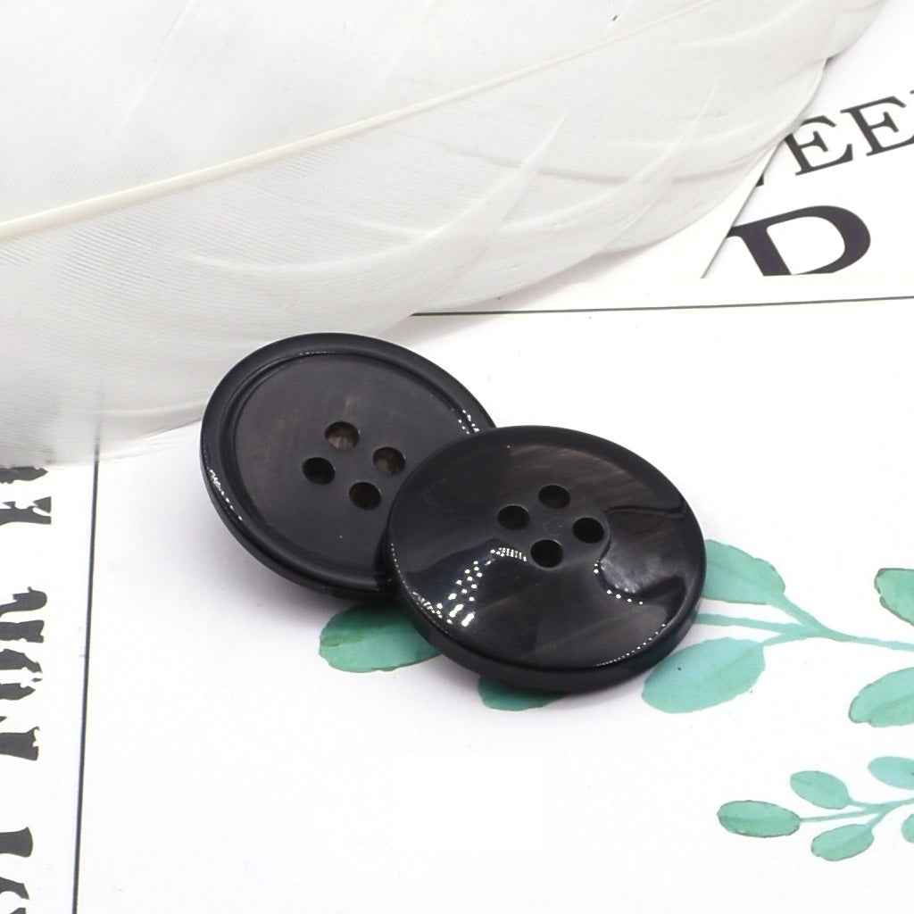 Round 4-hole dark navy resin coat buttons with pearl-look edge detail