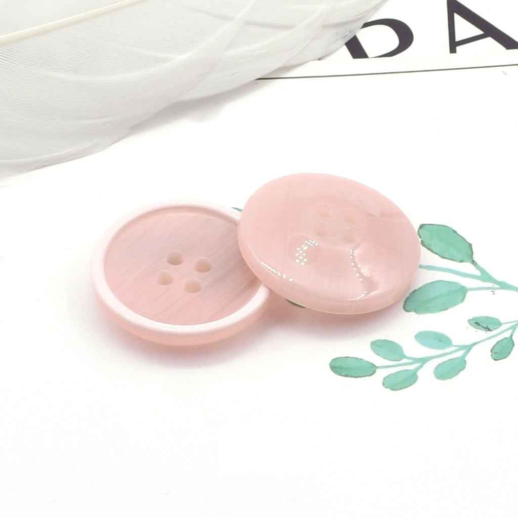 Round 4-hole blush pink resin coat buttons with pearl-look edge detail