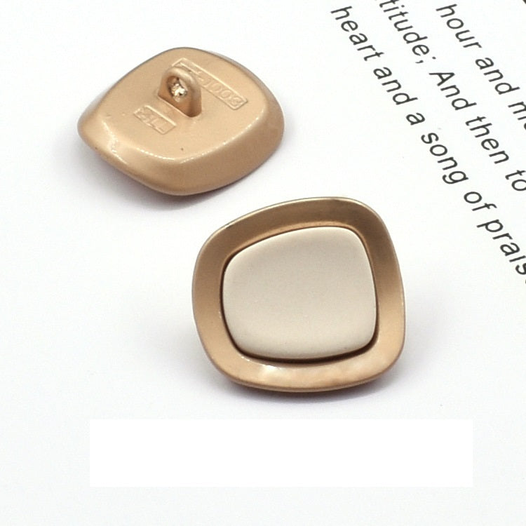 Square concave metal shank button, white front with visible back and shank