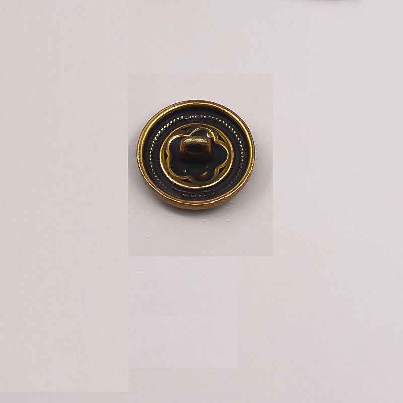 Vintage gold hollow rose metal button with raised flower center and beaded ring detail