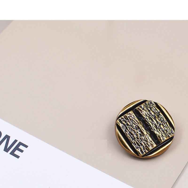 Vintage gold metal shank button, concave ridged surface