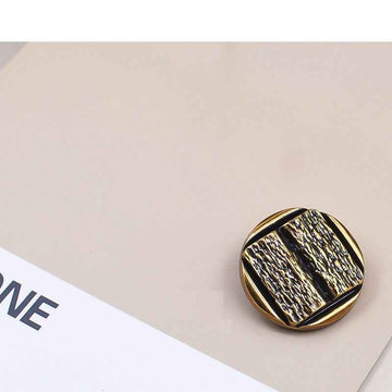Vintage gold metal shank button, concave ridged surface