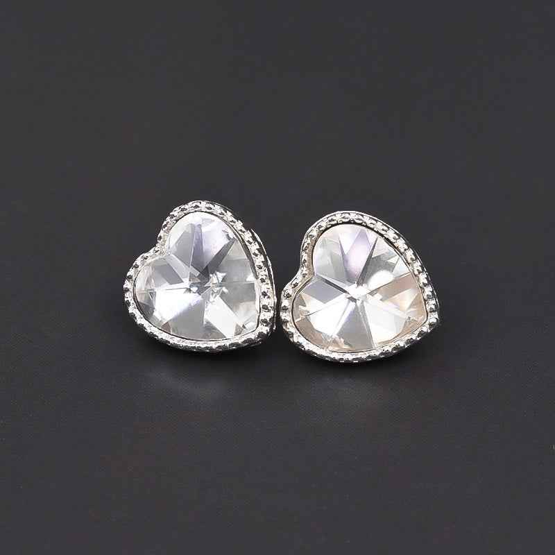 Two silver heart crystal metal buttons with rhinestone border, front