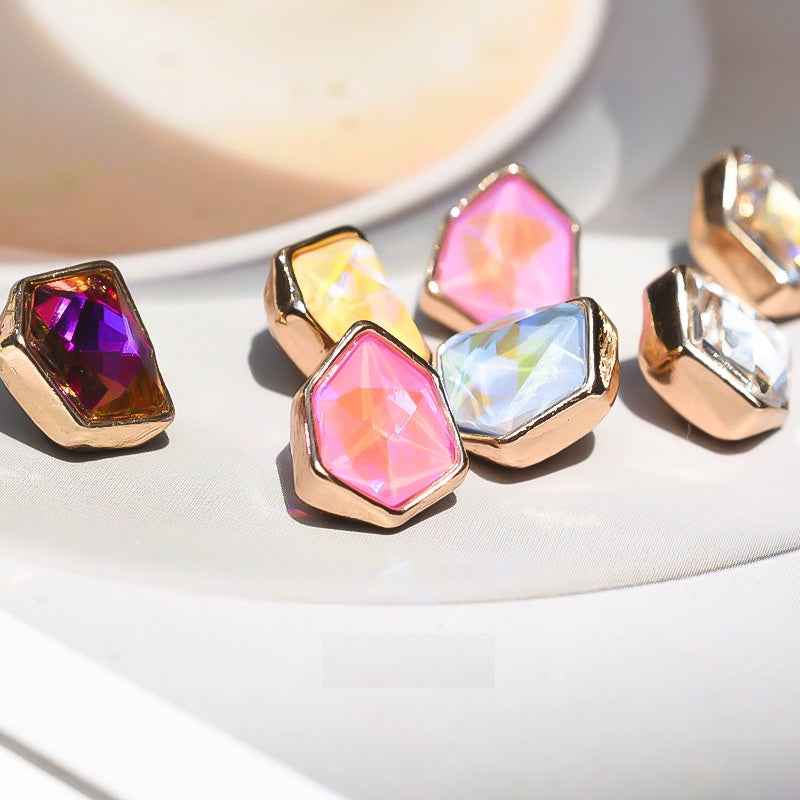 Irregular rhinestone button set: pink and iridescent stones with gold-tone edges