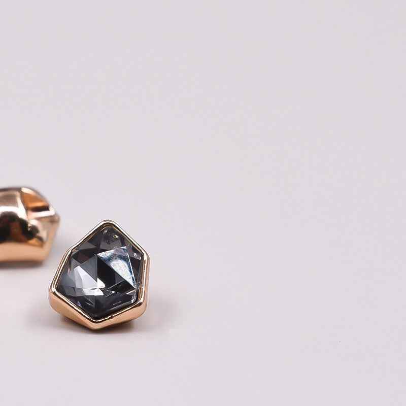 10mm irregular rhinestone button, rose-gold tone, dark faceted center in a square setting