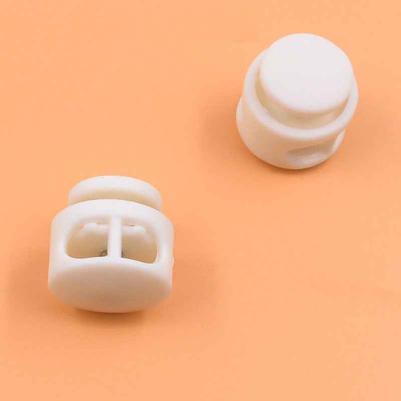 White plastic cord lock set: round tops with front slots for drawstrings