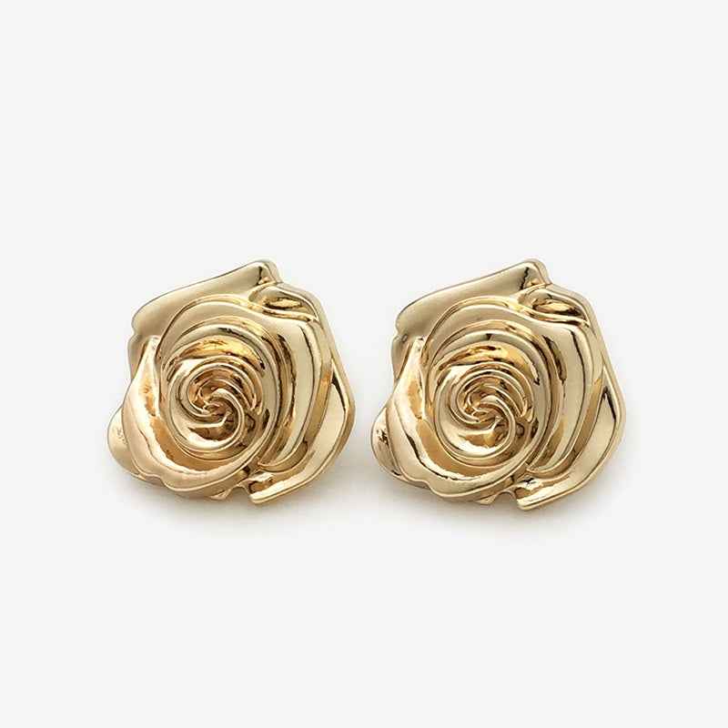 Gold metal 3D rose flower buttons, swirl center, pair close-up