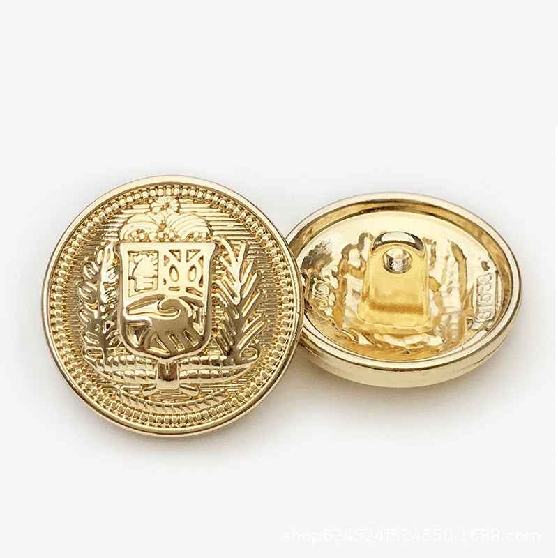 Round metal button, vintage knight shield, gold front and back view.
