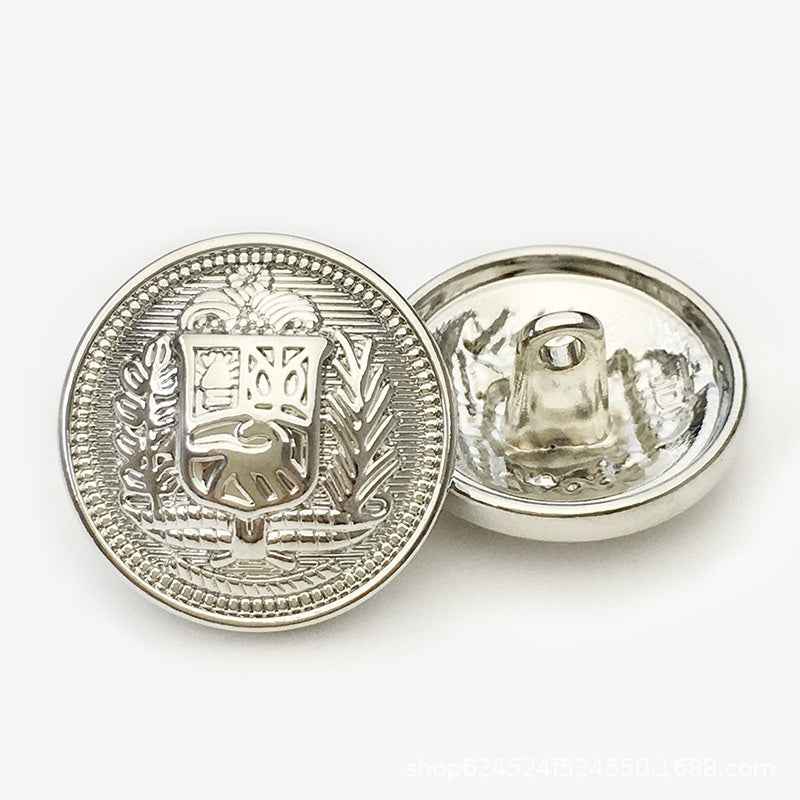 Round metal button, vintage knight shield, gold front and back view.