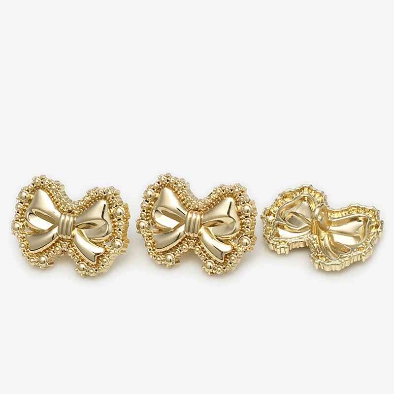 18mm/23mm gold bow metal shank button, bead-edged ribbon