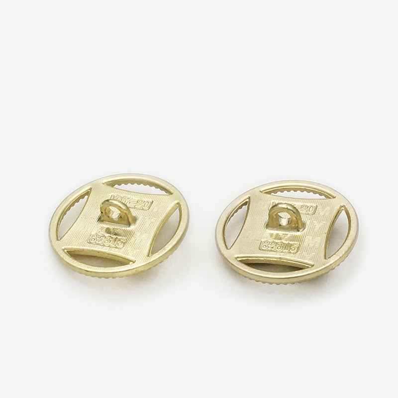 Gold shank button backs, two-hole design with embossed '20' mark