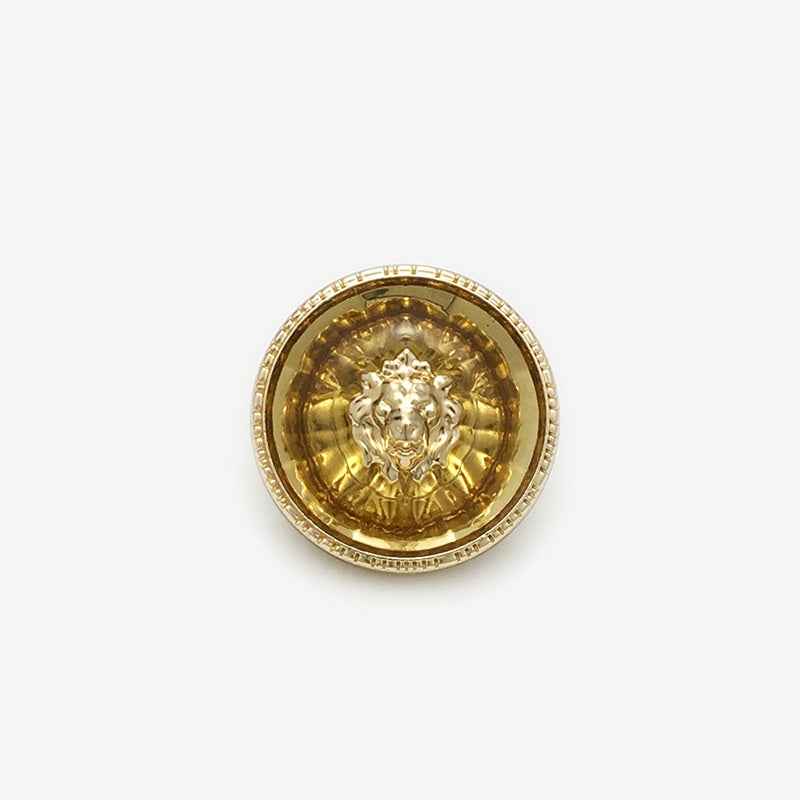 Red transparent resin lion-head round metal shank button, gold-tone rim