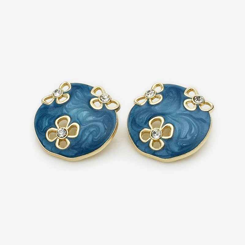 Oval floral enamel metal button, blue with gold edges and rhinestone flower details