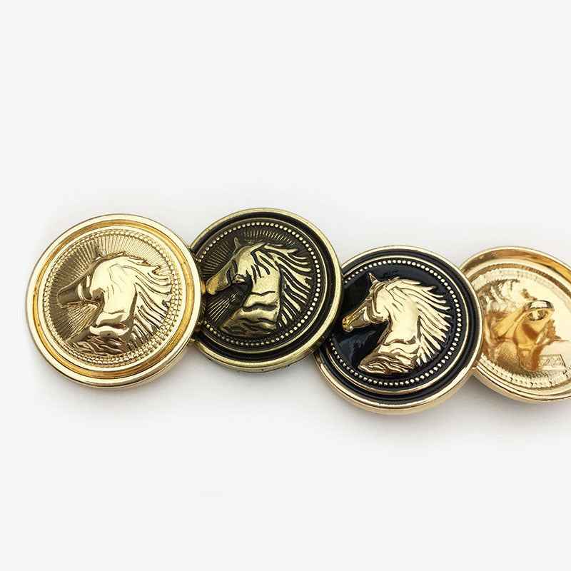Assorted round horse head metal shank buttons in gold and black