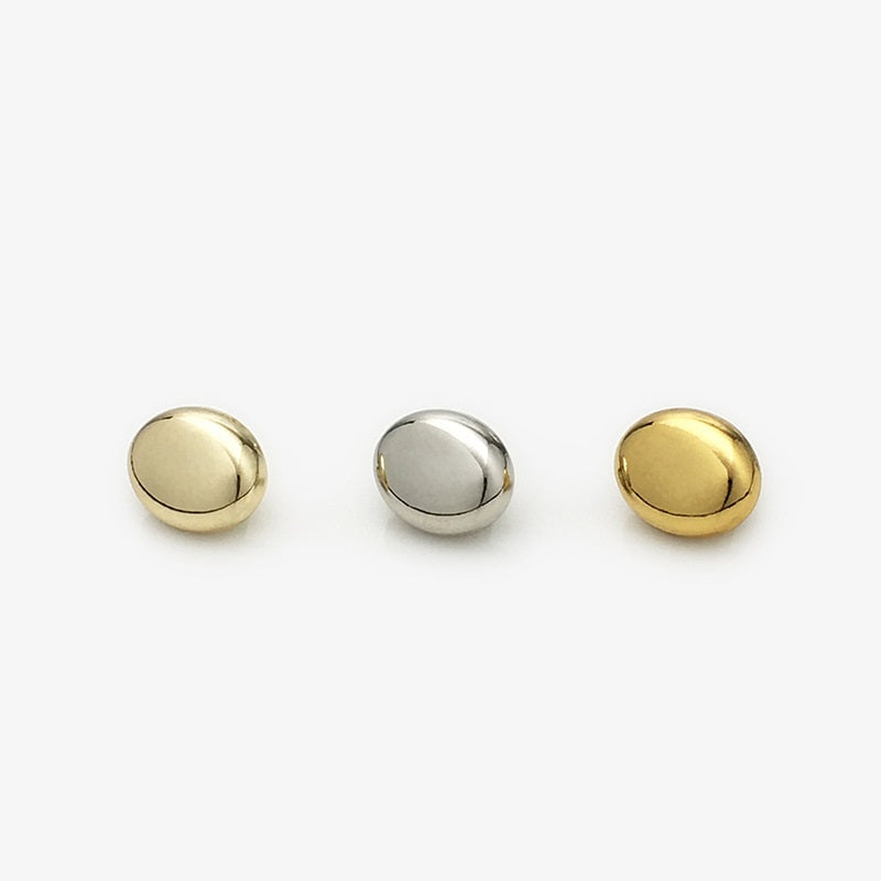 Oval metal shirt buttons, glossy gold and silver; 11mm, three front views