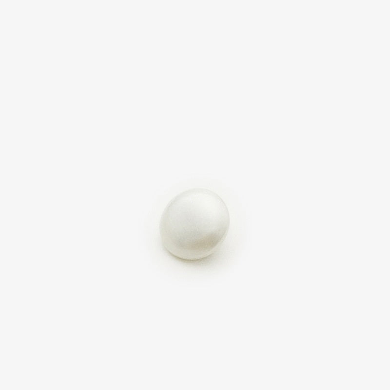 White pearl sew-on button with metal backing for coats, 1 pc close-up